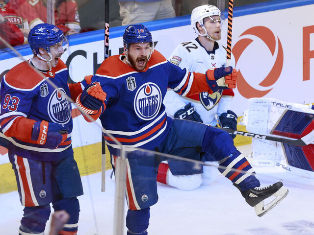 EDMONTON, ALBERTA - JUNE 21: Ryan Nugent-Hopkins #93 and Zach Hyman #18 of the Edmonton Oilers celebrate after Hyman's goal against the Florida Panthers during the second period of Game Six of the 2024 Stanley Cup Final at Rogers Place on June 21, 2024 in Edmonton, Alberta.