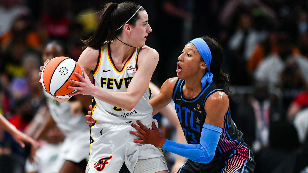 ATLANTA, GA JUNE 21: Indiana guard Caitlin Clark (22) looks to pass as Atlanta guard Aerial Powers (23) defends during the WNBA game between the Indiana Fever and the Atlanta Dream on June 21st, 2024 at State Farm Arena in Atlanta, GA.