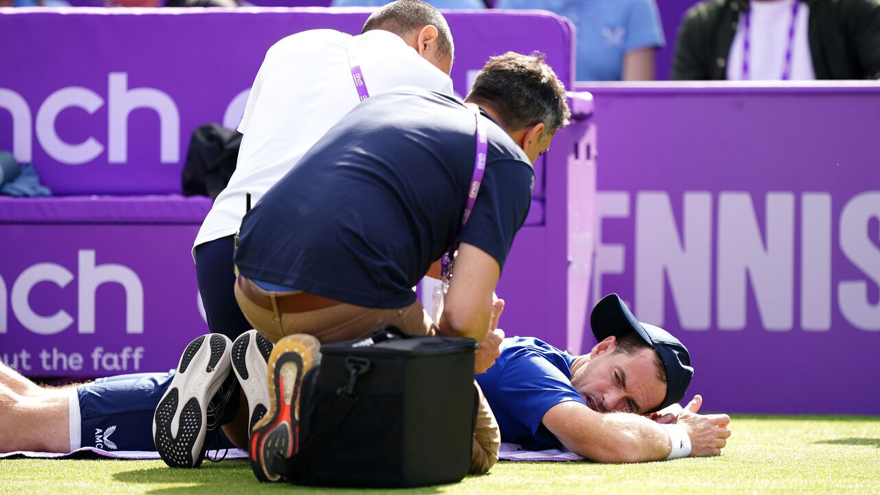Andy Murray receives treatment during his match against Jordan Thompson (not pictured) on day five of the cinch Championships at The Queen's Club, London. Picture date: Wednesday June 19, 2024.