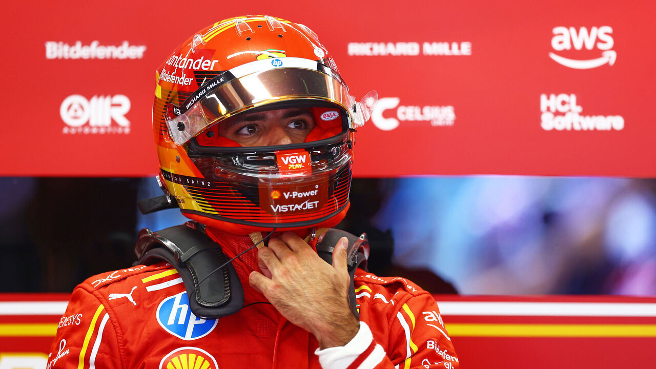 BARCELONA, SPAIN - JUNE 22: Carlos Sainz of Spain and Ferrari looks on in the garage during final practice ahead of the F1 Grand Prix of Spain at Circuit de Barcelona-Catalunya on June 22, 2024 in Barcelona, Spain.