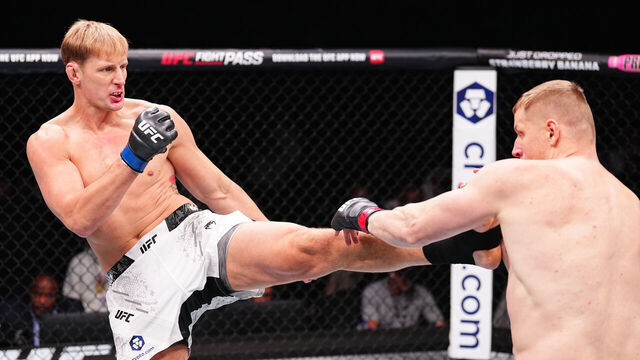 RIYADH, SAUDI ARABIA - JUNE 22: (L-R) Alexander Volkov of Russia kicks Sergei Pavlovich of Russia in a heavyweight fight during the UFC Fight Night event at Kingdom Arena on June 22, 2024 in Riyadh, Saudi Arabia.