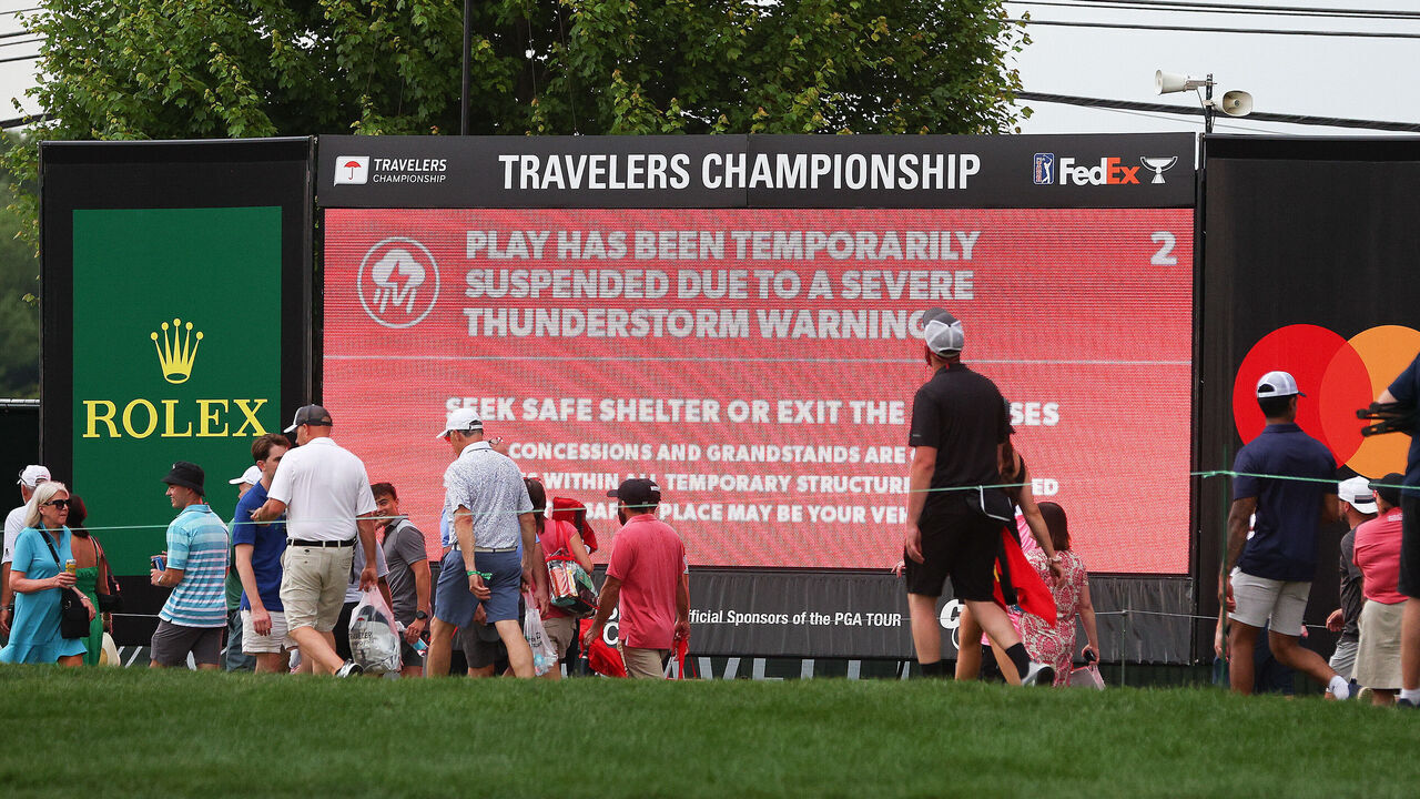 CROMWELL, CT - JUNE 22: General view of leader board notifying spectators game play has been temporarily suspended during the third round of the 2024 Travelers Championship on June 22, 2024, at TPC River Highlands in Cromwell, CT.
