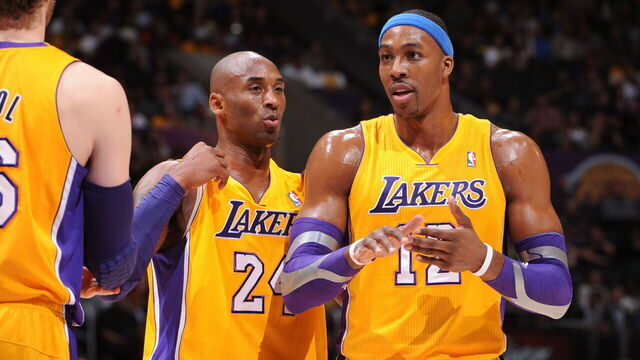 LOS ANGELES, CA - JANUARY 29: Kobe Bryant #24 and Dwight Howard #12 of the Los Angeles Lakers speak to each other during their game against the New Orleans Hornets at Staples Center on January 29, 2013 in Los Angeles, California. NOTE TO USER: User expressly acknowledges and agrees that, by downloading and/or using this Photograph, user is consenting to the terms and conditions of the Getty Images License Agreement. Mandatory Copyright Notice: Copyright 2013 NBAE