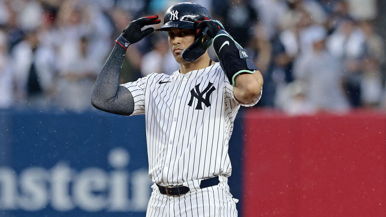 NEW YORK, NEW YORK - JUNE 22: Giancarlo Stanton #27 of the New York Yankees reacts after hitting a double in the bottom of the fourth inning during the game against the Atlanta Braves at Yankee Stadium on June 22, 2024 in New York City.