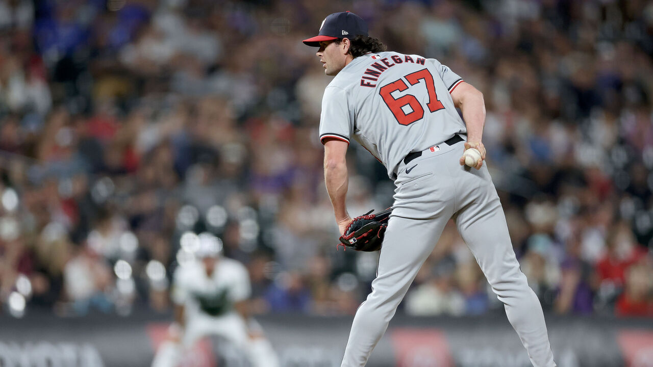 DENVER, COLORADO - JUNE 22: Kyle Finnegan #67 of the Washington Nationals throws against the Colorado Rockies in the ninth inning at Coors Field on June 22, 2024 in Denver, Colorado.