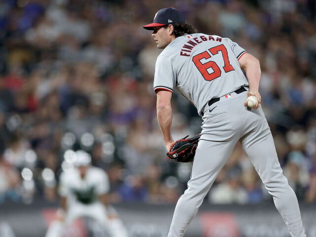 DENVER, COLORADO - JUNE 22: Kyle Finnegan #67 of the Washington Nationals throws against the Colorado Rockies in the ninth inning at Coors Field on June 22, 2024 in Denver, Colorado.