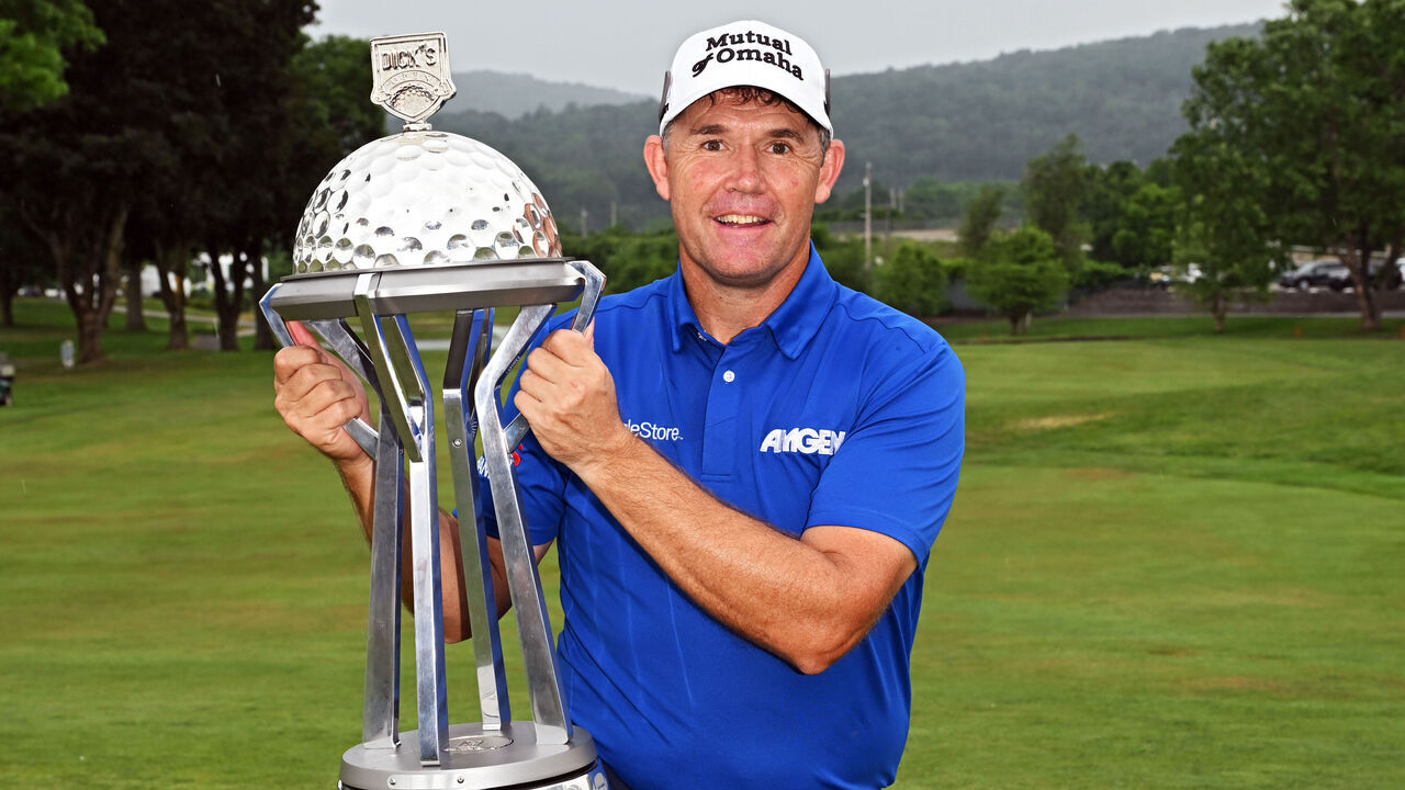 ENDICOTT, NEW YORK - JUNE 23: Padraig Harrington of Ireland holds the trophy after winning the final round of the DICK'S Sporting Goods Open at En-Joie Golf Club on June 23, 2024 in Endicott, New York.