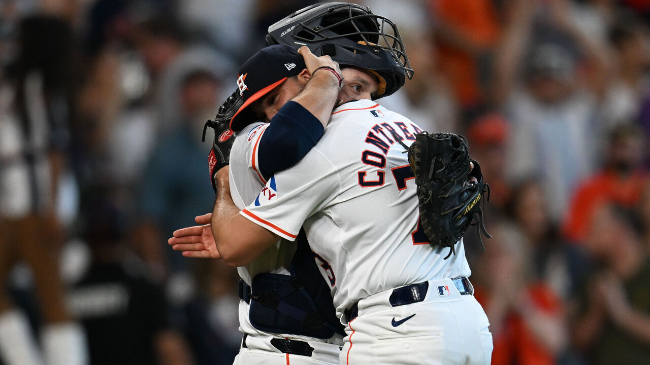 HOUSTON, TEXAS - JUNE 23: Luis Contreras #73 and Cesar Salazar #18 of the Houston Astros celebrate after winning against the Baltimore Orioles by a score of 8-1 at Minute Maid Park on June 23, 2024 in Houston, Texas.