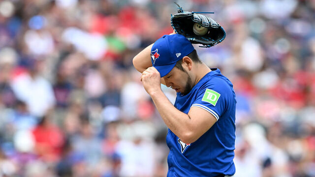 CLEVELAND, OHIO - JUNE 23: Yusei Kikuchi #16 of the Toronto Blue Jays looks on during the first inning against the Cleveland Guardians at Progressive Field on June 23, 2024 in Cleveland, Ohio.
