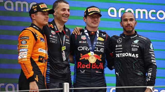 BARCELONA, SPAIN - JUNE 23: Race winner Max Verstappen of the Netherlands and Oracle Red Bull Racing, Second placed Lando Norris of Great Britain and McLaren, Third placed Lewis Hamilton of Great Britain and Mercedes and David Jackson, Oracle Red Bull Racing Systems Design Group Leader celebrate on the podium during the F1 Grand Prix of Spain at Circuit de Barcelona-Catalunya on June 23, 2024 in Barcelona, Spain.