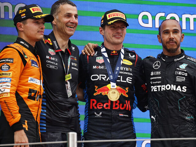 BARCELONA, SPAIN - JUNE 23: Race winner Max Verstappen of the Netherlands and Oracle Red Bull Racing, Second placed Lando Norris of Great Britain and McLaren, Third placed Lewis Hamilton of Great Britain and Mercedes and David Jackson, Oracle Red Bull Racing Systems Design Group Leader celebrate on the podium during the F1 Grand Prix of Spain at Circuit de Barcelona-Catalunya on June 23, 2024 in Barcelona, Spain.