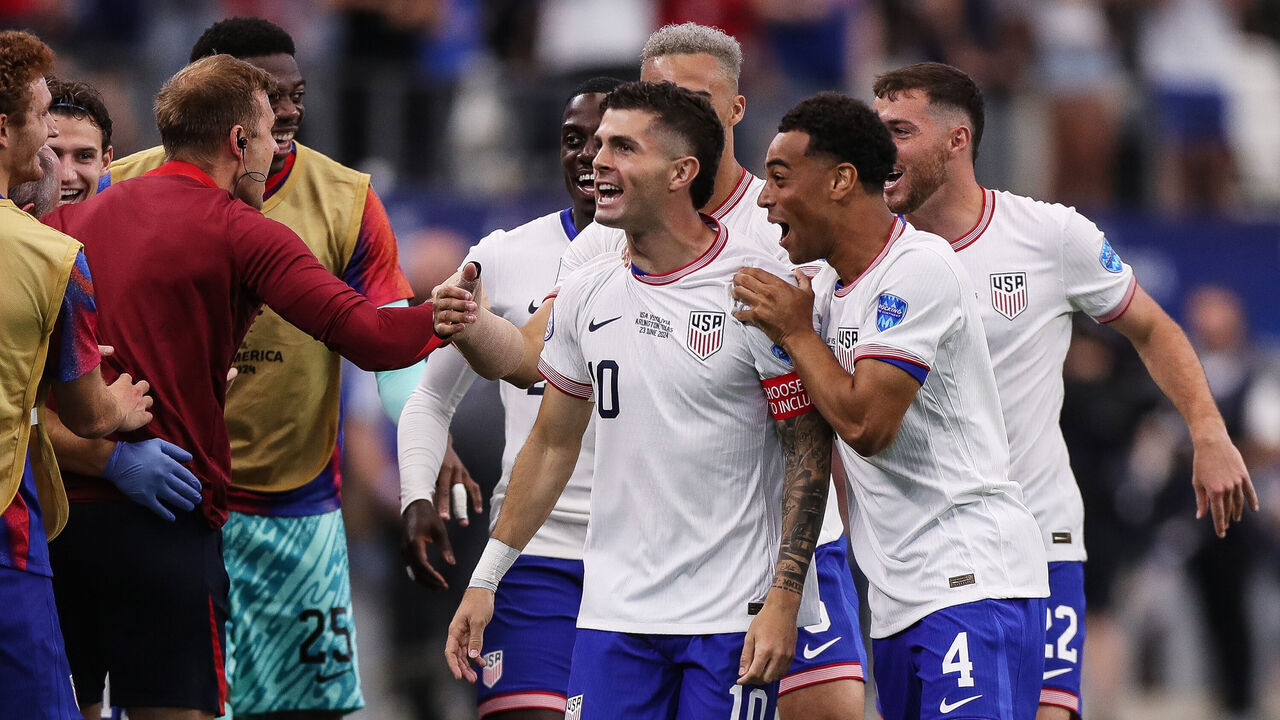 ARLINGTON, TEXAS - JUNE 23: Christian Pulisic of United States celebrates after scoring the team's first goal during the CONMEBOL Copa America 2024 Group C match between United States and Bolivia at AT&T Stadium on June 23, 2024 in Arlington, Texas.