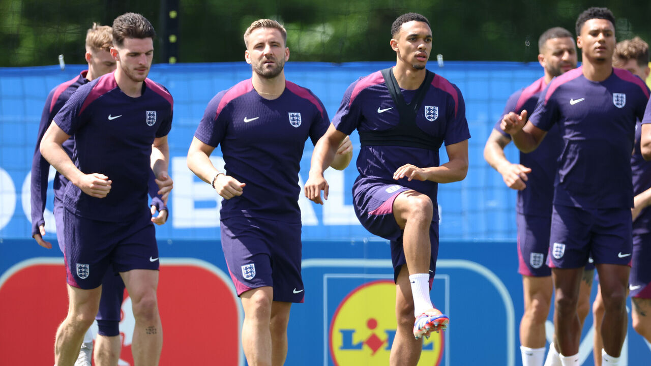 BLANKENHAIN, GERMANY - JUNE 24: Declan Rice, Luke Shaw, Trent Alexander-Arnold, Ollie Watkins, Joe Gomez and teammates of England warm up during a training session at Spa & Golf Resort Weimarer Land on June 24, 2024 in Blankenhain, Germany.