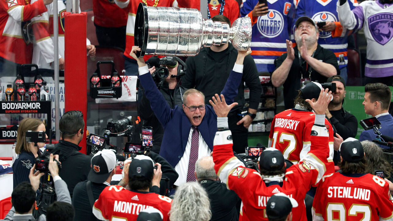 SUNRISE, FLORIDA - JUNE 24: Head coach Paul Maurice of the Florida Panthers lifts the Stanley Cup after Florida's 2-1 victory against the Edmonton Oilers in Game Seven of the 2024 Stanley Cup Final at Amerant Bank Arena on June 24, 2024 in Sunrise, Florida.