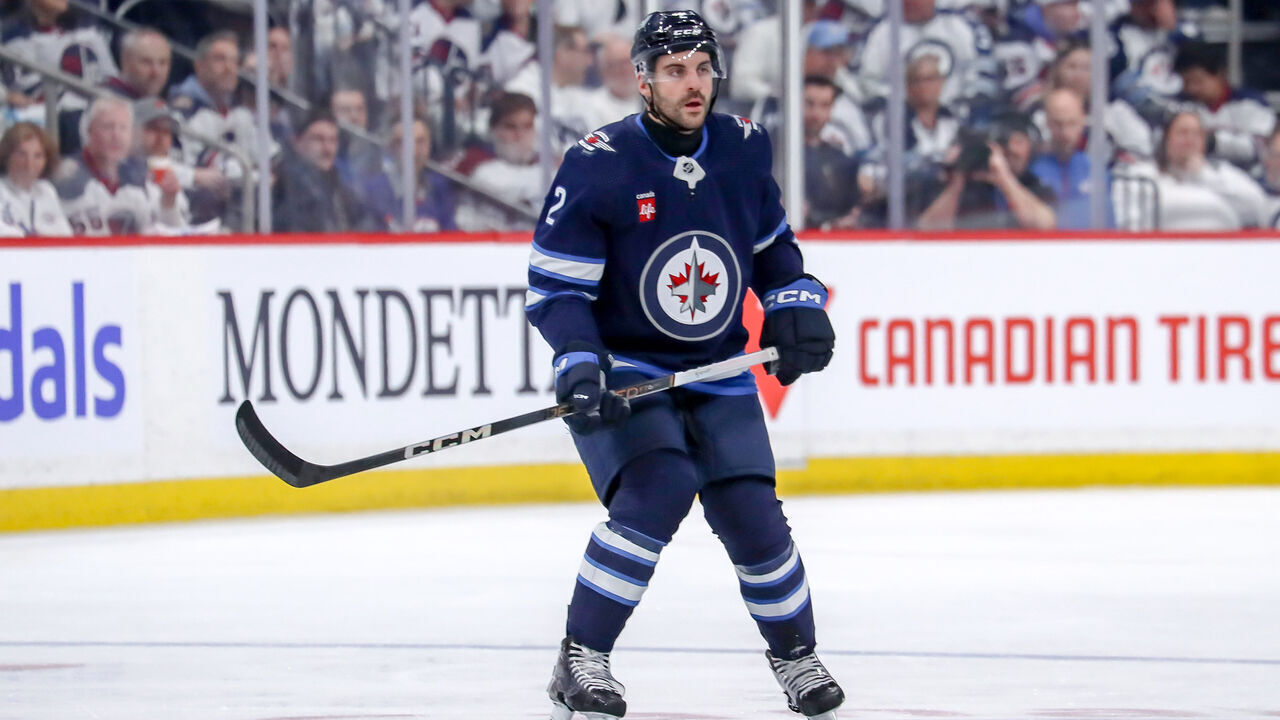 WINNIPEG, CANADA - APRIL 30: Dylan DeMelo #2 of the Winnipeg Jets keeps an eye on the play during second period action against the Colorado Avalanche in Game Five of the First Round of the 2024 Stanley Cup Playoffs at the Canada Life Centre on April 30, 2024 in Winnipeg, Manitoba, Canada. The Avs defeated the Jets 6-3 and win the series 4-1.