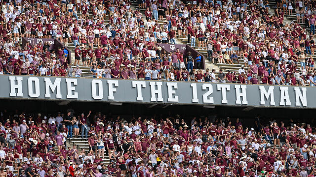 COLLEGE STATION, TX - OCTOBER 28: The 12th Man signage splits the crowd in two during the football game between the South Carolina Gamecocks and Texas A&M Aggies at Kyle Field on October 28, 2023, in College Station, Texas.