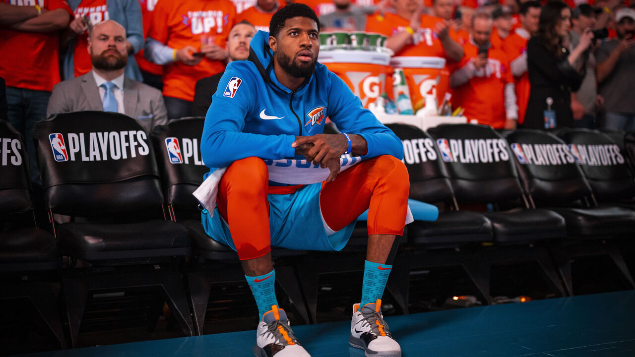 OKLAHOMA CITY, OK - APRIL 19: Paul George #13 of the Oklahoma City Thunder looks on prior to a game against the Portland Trail Blazers before Round One Game Three of the 2019 NBA Playoffs on April 19, 2019 at Chesapeake Energy Arena in Oklahoma City, Oklahoma. Mandatory Copyright Notice: Copyright 2019 NBAE