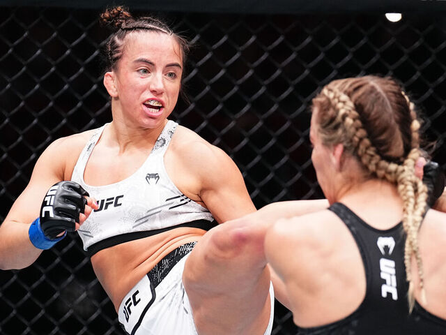 MIAMI, FLORIDA - MARCH 09: (L-R) Maycee Barber kicks Katlyn Cerminara in a flyweight fight during the UFC 299 event at Kaseya Center on March 09, 2024 in Miami, Florida.