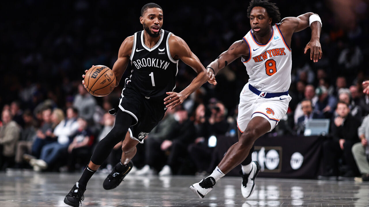 NEW YORK, NEW YORK - JANUARY 23: Mikal Bridges #1 of the Brooklyn Nets is defended by OG Anunoby #8 of the New York Knicks during the first quarter of the game at Barclays Center on January 23, 2024 in New York City.