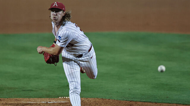 FAYETTEVILLE, AR - June 01: Arkansas pitcher Hagen Smith (33) pitches in the NCAA regional game between the Arkansas Razorbacks and the Kansas State Wildcats on June 01, 2024, at Baum Stadium in Fayetteville, AR.