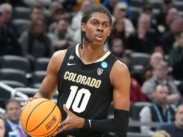 INDIANAPOLIS, INDIANA - MARCH 22: Cody Williams #10 of the Colorado Buffaloes dribbles the ball during the NCAA Men's Basketball Tournament - First Round game against the Florida Gators at Gainbridge Fieldhouse on March 22, 2024 in Indianapolis, Indiana.
