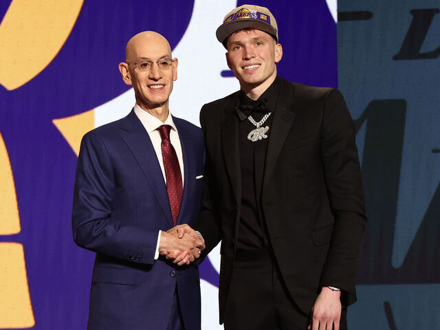 NEW YORK, NEW YORK - JUNE 26: Dalton Knecht (R) shakes hands with NBA commissioner Adam Silver (L) after being drafted 17th overall by the Los Angeles Lakers during the first round of the 2024 NBA Draft at Barclays Center on June 26, 2024 in the Brooklyn borough of New York City.