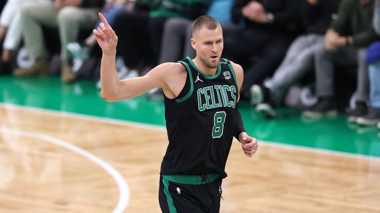 BOSTON, MASSACHUSETTS - JUNE 09: Kristaps Porzingis #8 of the Boston Celtics reacts during the first quarter against the Dallas Mavericks in Game Two of the 2024 NBA Finals at TD Garden on June 09, 2024 in Boston, Massachusetts.