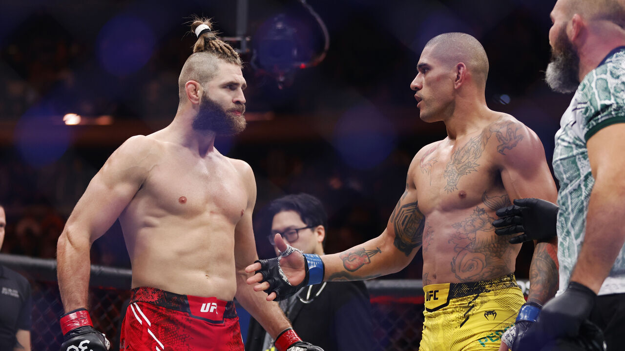 NEW YORK, NEW YORK - NOVEMBER 11: Alex Pereira of Brazil embraces Jiri Prochazka of the Czech Republic in the UFC light heavyweight championship fight during the UFC 295 event at Madison Square Garden on November 11, 2023 in New York City.