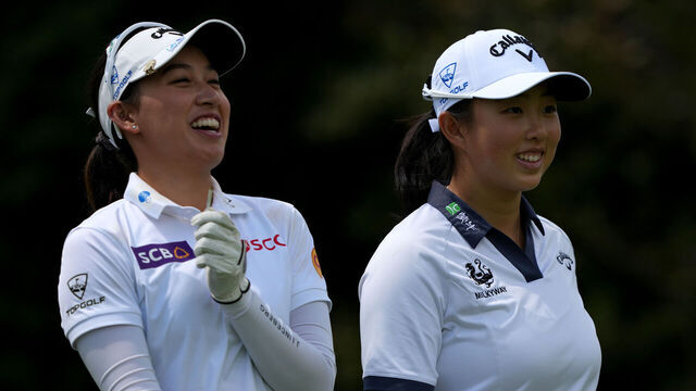 MIDLAND, MICHIGAN - JUNE 27: (L-R) Atthaya Thitikul of Thailand and Ruoning Yin of China walk off the sixth tee during the first round of the Dow Championship at Midland Country Club on June 27, 2024 in Midland, Michigan.