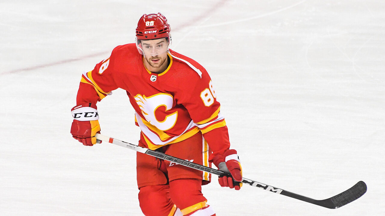 CALGARY, CANADA - FEBRUARY 22: Andrew Mangiapane #88 of the Calgary Flames in action against the Boston Bruins during an NHL game at Scotiabank Saddledome on February 22, 2024 in Calgary, Alberta, Canada.