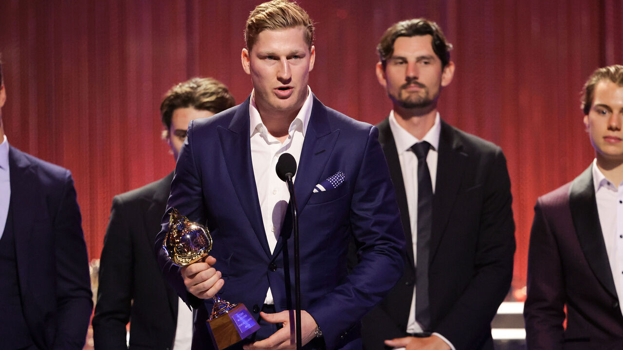 LAS VEGAS, NEVADA - JUNE 27: Nathan MacKinnon of the Colorado Avalanche accepts the Hart Memorial Trophy during the 2024 NHL Awards at BleauLive Theater at Fontainebleau Las Vegas on June 27, 2024 in Las Vegas, Nevada.