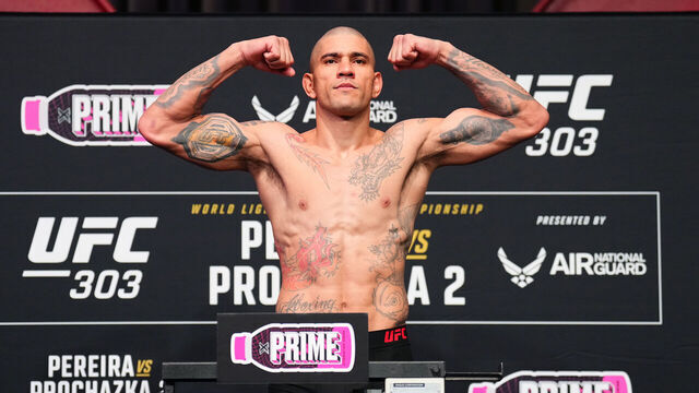 LAS VEGAS, NEVADA - JUNE 28: Alex Pereira of Brazil poses on the scale during the UFC 303 official weigh-ins at UFC Apex on June 28, 2024 in Las Vegas, Nevada.