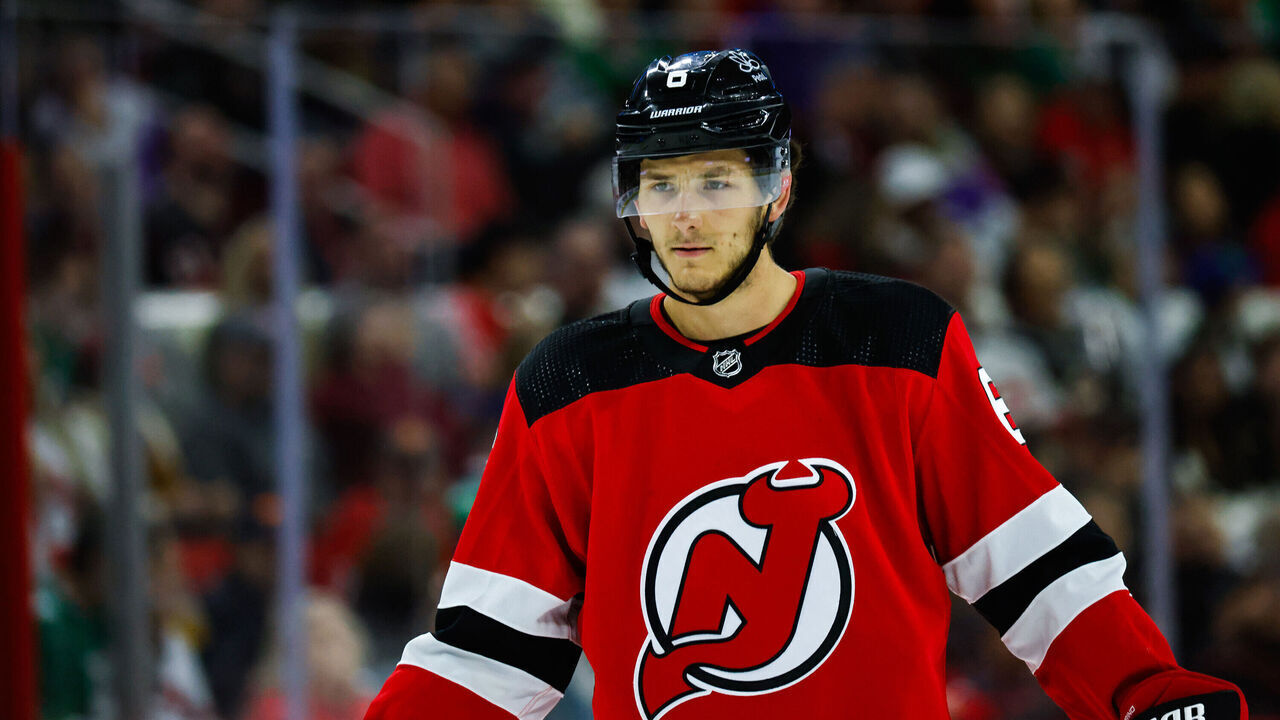 RALEIGH, NC - FEBRUARY 10: John Marino #6 of the New Jersey Devils looks on during the third period of the game against the Carolina Hurricanes at PNC Arena on February 10, 2024 in Raleigh, North Carolina. Hurricanes defeat Devils 1-0.