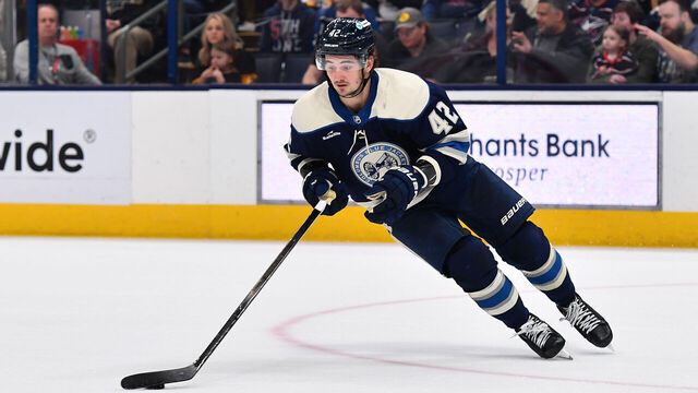 COLUMBUS, OHIO - MARCH 30: Alexandre Texier #42 of the Columbus Blue Jackets skates with the puck during the overtime period of a game against the Pittsburgh Penguins at Nationwide Arena on March 30, 2024 in Columbus, Ohio.