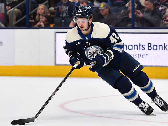 COLUMBUS, OHIO - MARCH 30: Alexandre Texier #42 of the Columbus Blue Jackets skates with the puck during the overtime period of a game against the Pittsburgh Penguins at Nationwide Arena on March 30, 2024 in Columbus, Ohio.