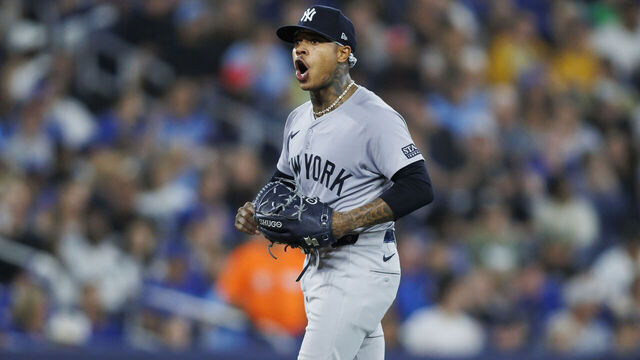 TORONTO, CANADA - JUNE 28: Marcus Stroman #0 of the New York Yankees reacts after giving up a single to Vladimir Guerrero Jr. #27 of the Toronto Blue Jays in the fifth inning of their MLB game at Rogers Centre on June 28, 2024 in Toronto, Ontario, Canada.