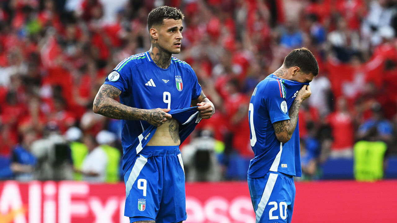 BERLIN, GERMANY - JUNE 29: Gianluca Scamacca and Mattia Zaccagni of Italy show dejection after defeat, which results in the team been knocked out of the tournament after the UEFA EURO 2024 round of 16 match between Switzerland and Italy at Olympiastadion on June 29, 2024 in Berlin, Germany.