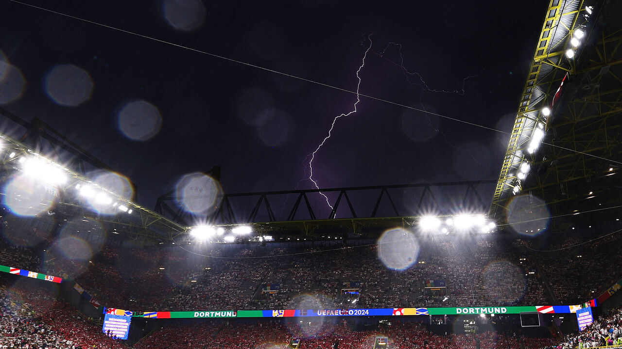 DORTMUND, GERMANY - JUNE 29: General view inside the stadium as a lightening is seen during the UEFA EURO 2024 round of 16 match between Germany and Denmark at Football Stadium Dortmund on June 29, 2024 in Dortmund, Germany.