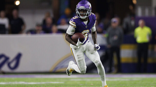 MINNEAPOLIS, MINNESOTA - NOVEMBER 27: Jordan Addison #3 of the Minnesota Vikings runs the ball after a catch during an NFL football game against the Chicago Bears at U.S. Bank Stadium on November 27, 2023 in Minneapolis, Minnesota.