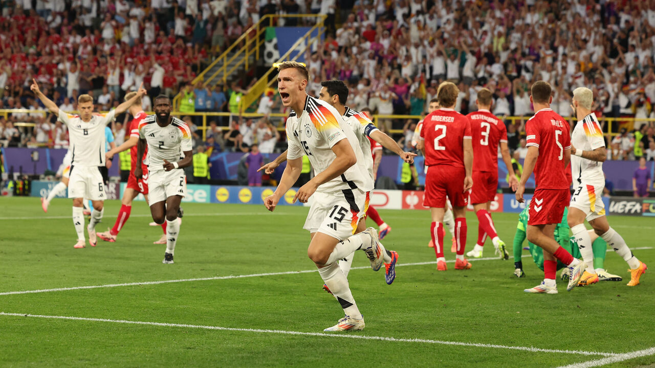 DORTMUND, GERMANY - JUNE 29: Nico Schlotterbeck of Germany celebrates after he scores the opening goal only for the referee to disallow it during the UEFA EURO 2024 round of 16 match between Germany and Denmark at Football Stadium Dortmund on June 29, 2024 in Dortmund, Germany.
