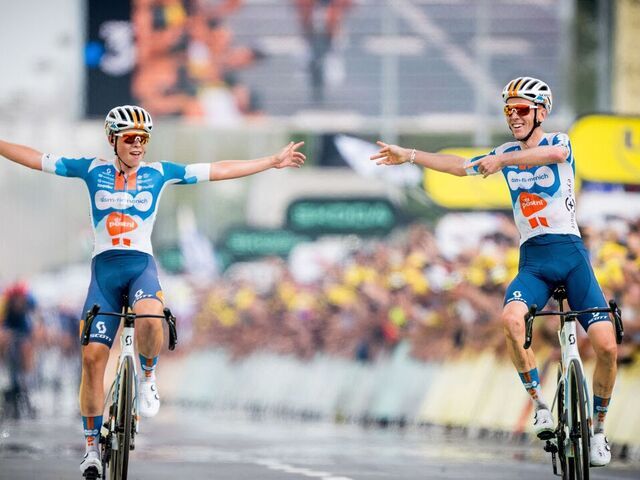 Dutch Frank van den Broek of Team DSM-Firmenich PostNL and French Romain Bardet of Team DSM-Firmenich PostNL celebrate as they cross the finish line at stage 1 of the 2024 Tour de France cycling race, from Florence, Italy to Rimini, Italy (206 km) on Saturday 29 June 2024. The 111th edition of the Tour de France starts on Saturday 29 June and will finish in Nice, France on 21 July. BELGA PHOTO JASPER JACOBS