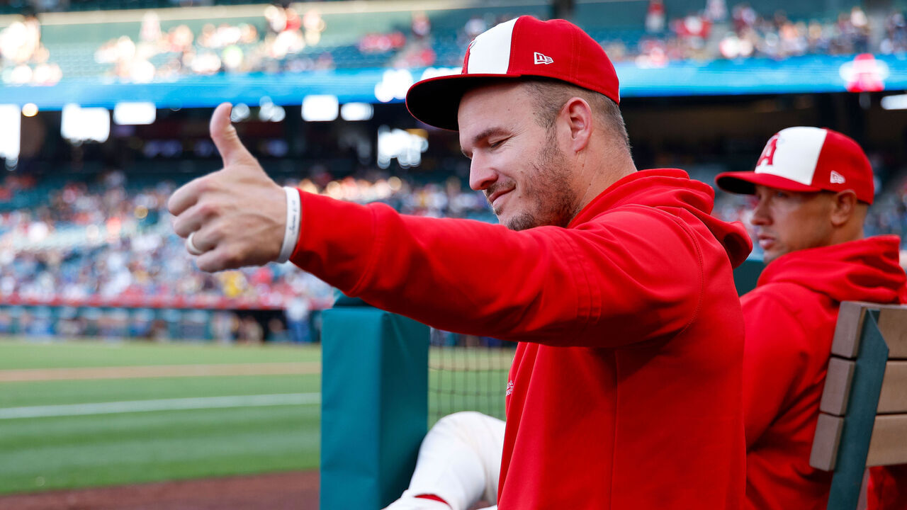 ANAHEIM, CALIFORNIA - JUNE 5: Mike Trout #27 of the Los Angeles Angels gestures in the dugout prior to a game against the San Diego Padres at Angel Stadium of Anaheim on June 5, 2024 in Anaheim, California.