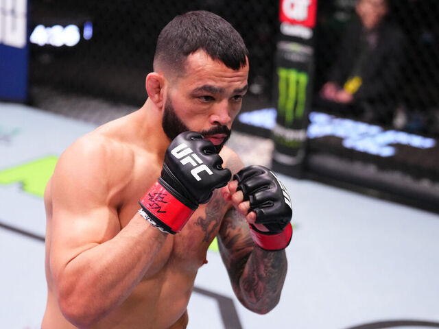 LAS VEGAS, NEVADA - FEBRUARY 10: Dan Ige battles Andre Fili in a featherweight fight during the UFC Fight Night event at UFC APEX on February 10, 2024 in Las Vegas, Nevada.