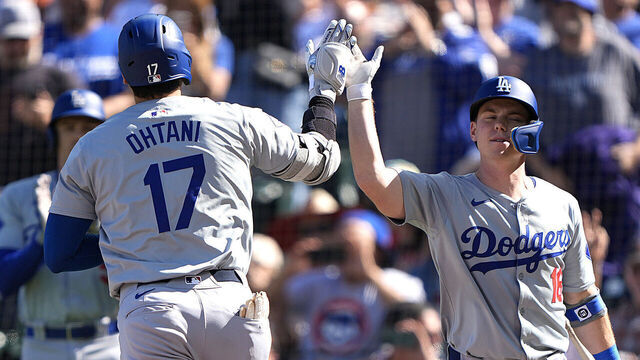 SAN FRANCISCO, CALIFORNIA - JUNE 29: Shohei Ohtani #17 of the Los Angeles Dodgers is congratulated by Will Smith #16 after Ohtani hit a solo home run against the San Francisco Giants in the top of the third inning at Oracle Park on June 29, 2024 in San Francisco, California.