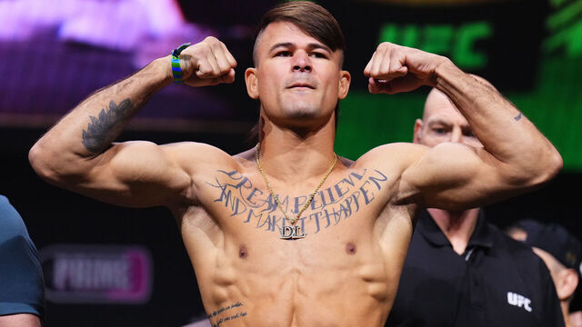 LAS VEGAS, NEVADA - JUNE 28: Diego Lopes of Brazil poses on stage during the UFC 303 ceremonial weigh-in at T-Mobile Arena on June 28, 2024 in Las Vegas, Nevada.