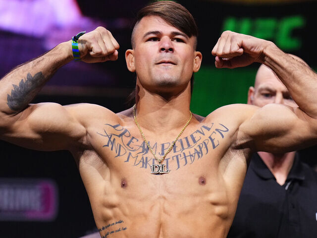 LAS VEGAS, NEVADA - JUNE 28: Diego Lopes of Brazil poses on stage during the UFC 303 ceremonial weigh-in at T-Mobile Arena on June 28, 2024 in Las Vegas, Nevada.