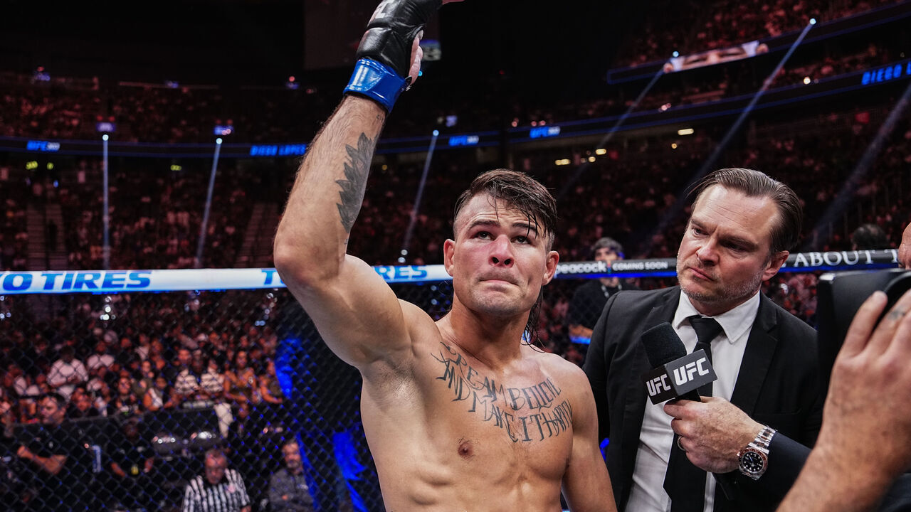 LAS VEGAS, NEVADA - JUNE 29: Diego Lopes of Brazil reacts to his victory over Dan Ige in a 165-pound catchweight fight during the UFC 303 event at T-Mobile Arena on June 29, 2024 in Las Vegas, Nevada.