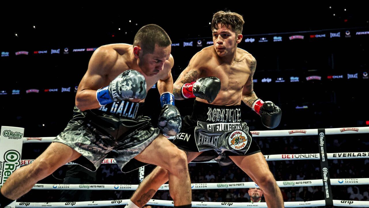 PHOENIX, ARIZONA - JUNE 29: Juan Francisco El 'Gallo' Estrada (L )and Jesse Bam Rodríguez (R) fight during their fight for Estrada's WBC and Ring Magazine super flyweight titles at Footprint Center ahead of the 'Gallo' Estrada and Jesse 'Bam' Rodríguez title fight at Footprint Center on June 29, 2023 in Phoenix, Arizona.