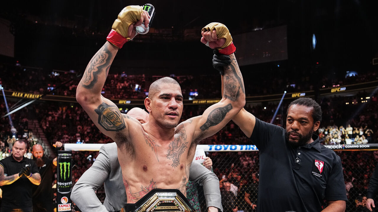 LAS VEGAS, NEVADA - JUNE 29: Alex Pereira of Brazil reacts to his victory over Jiri Prochazka of the Czech Republic in the UFC light heavyweight championship fight during the UFC 303 event at T-Mobile Arena on June 29, 2024 in Las Vegas, Nevada.