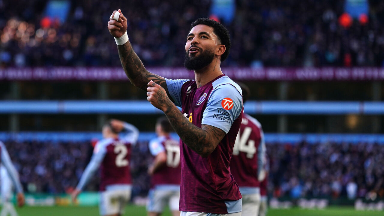 Aston Villa's Douglas Luiz celebrates scoring their side's third goal of the game during the Premier League match at Villa Park, Birmingham. Picture date: Saturday February 24, 2024.